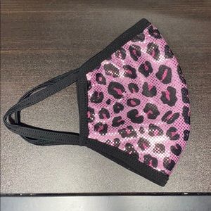One reusable pink leopard print mask